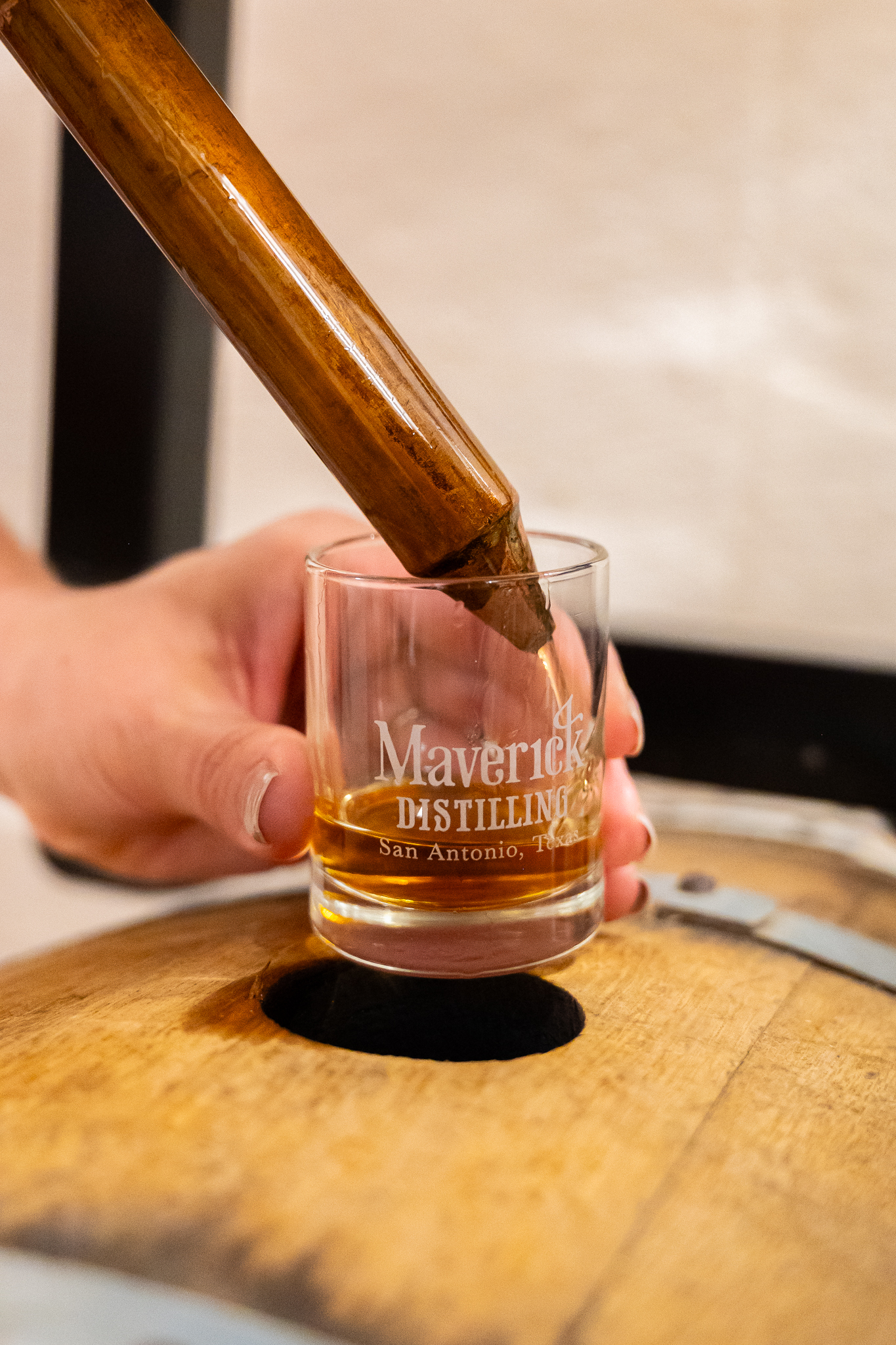 Pouring a Maverick whiskey at the Lockwood Bar